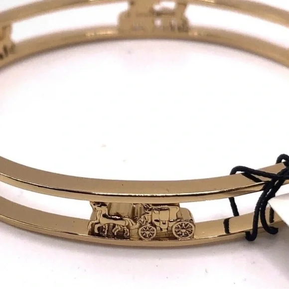 Coach Elegant Gold Bracelet with Carriage Design - Picture 2 of 3